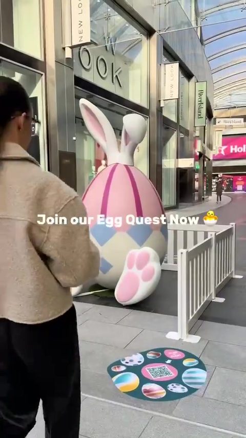 Participant discovering the Quest trail start point at a shopping centre